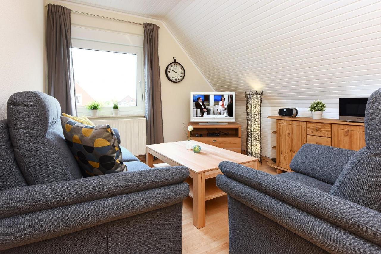 Ferienwohnungen Haus Gezeiten Neuharlingersiel Esterno foto