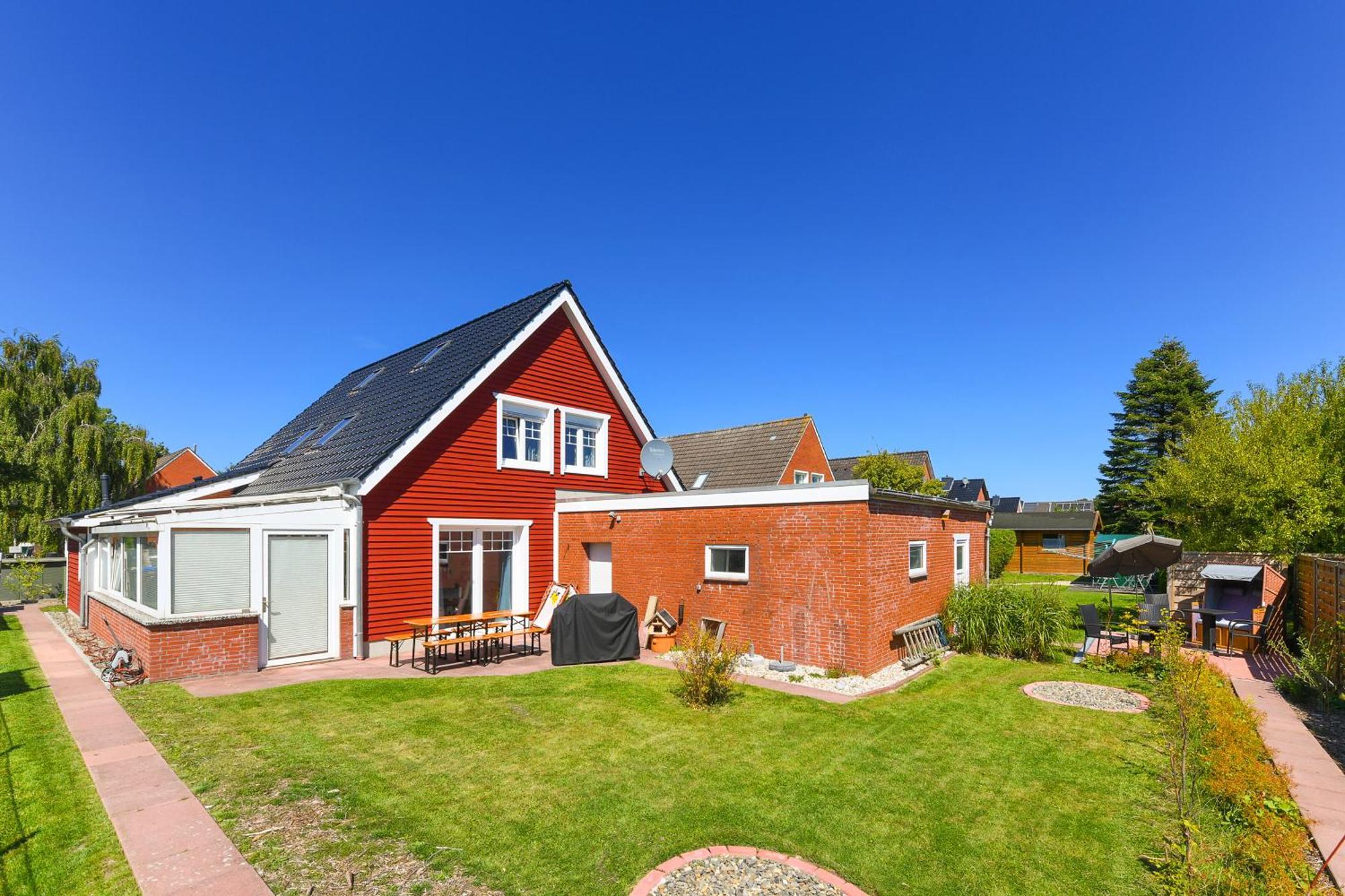 Ferienwohnungen Haus Gezeiten Neuharlingersiel Esterno foto